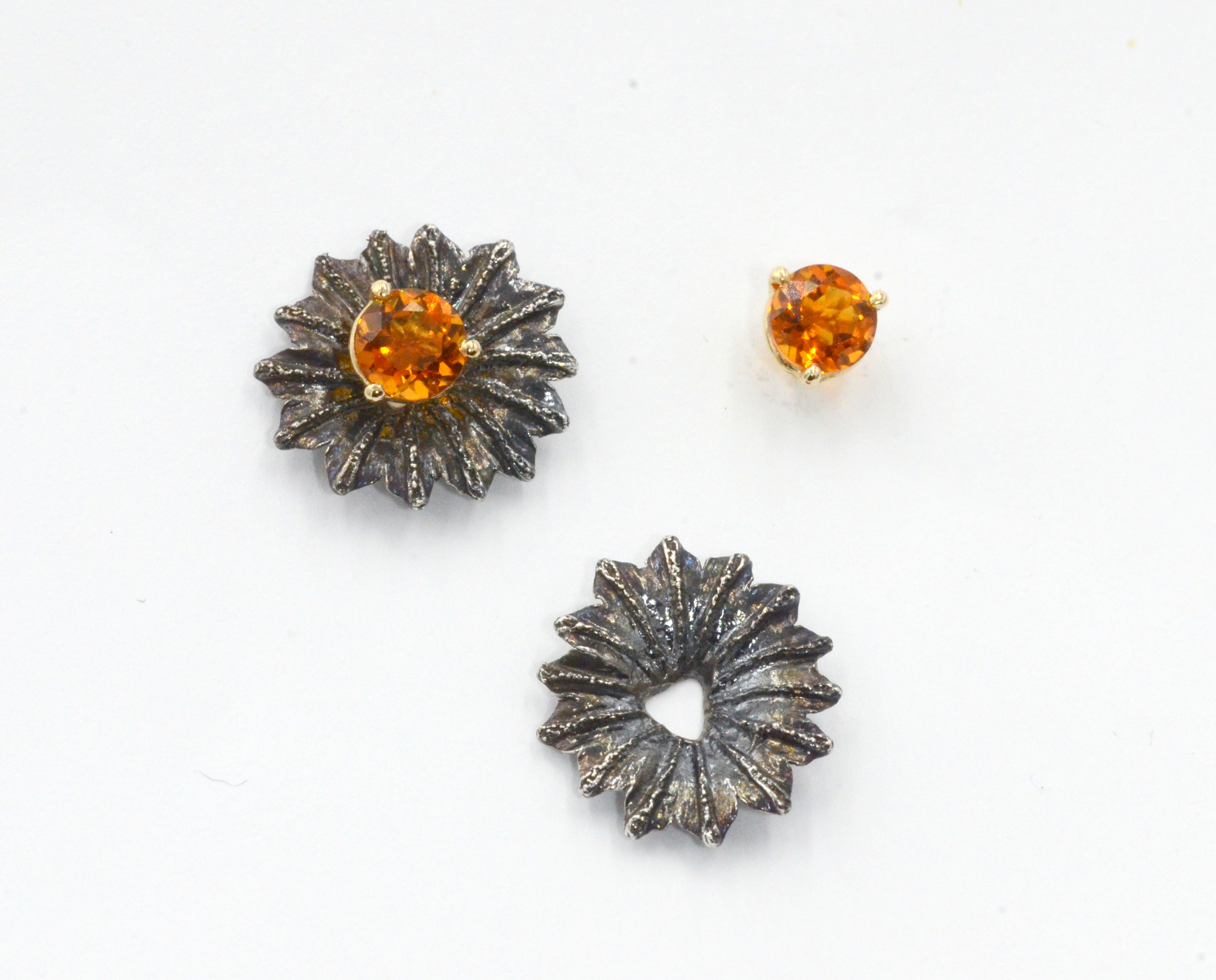 Solid Sterling Silver Poppy Flower tops designed as jackets to accompany stud earrings. 1/2 ' diameter. Silver has been oxidized to accentuate the natural texture.